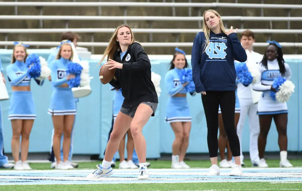 CHAPEL HILL — Carolina fans already knew that Alyssa Ustby was versatile from watching her score, pass, rebound, distribute and defend on the basketball court with dogged determination. But they didn’t know just how versatile until she kicked it up a few notches at halftime of UNC’s spring football game Saturday at Kenan Stadium. The level of awe Tar Heels fans already had for her just multiplied.